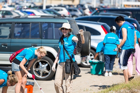 Volunteer holding up a sock