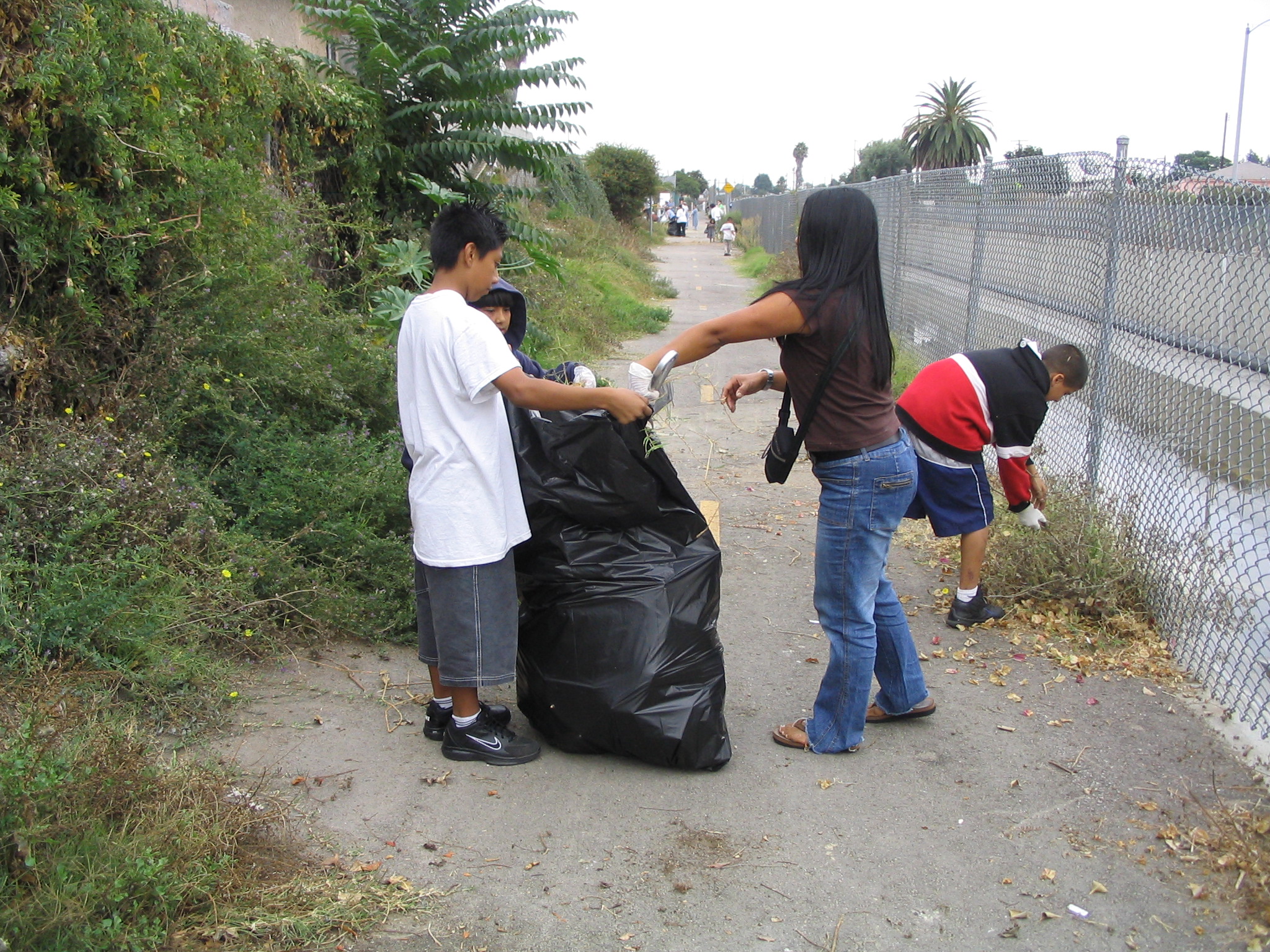 Cleaning up the bike path along Compton Creek.