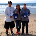 A group of young people at Nothin' But Sand beach cleanup in Venice